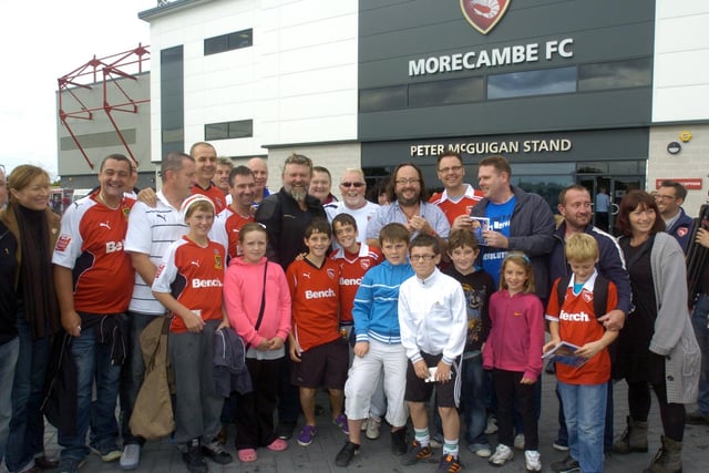 The Hairy Bikers, who were being filmed at the Globe Arena at the Crawley Town game, pictured with Morecambe supporters before the game