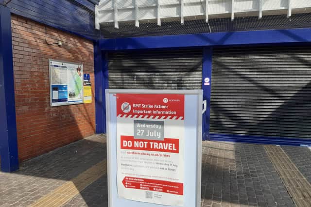 A sign warns travellers there will be no trains today