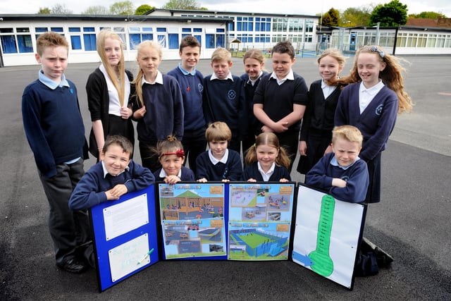 Whitburn Village Primary School council members were pictured with plans for the school's new outdoor area in 2013.