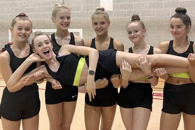 The rhythmic gymnasts from Fylde Coast RGA need a little help to represent Great Britain conquer the world