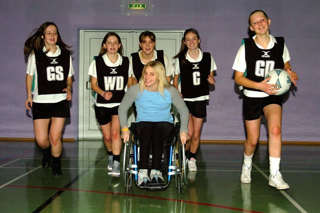 Shelly Woods pictured with some of the school U14 netball team, before she opened the new sports hall in 2005. With Shelly are, from left, Elyse Cottrell, Nicola Sharples, Alicia Connolly, Hayley Thompson and Hannah Johnston