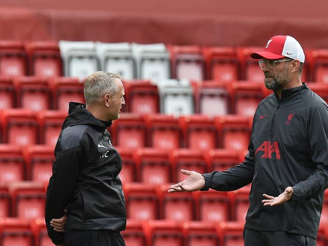 Neil Critchley with Jurgen Klopp (Photo by John Powell/Liverpool FC via Getty Images)