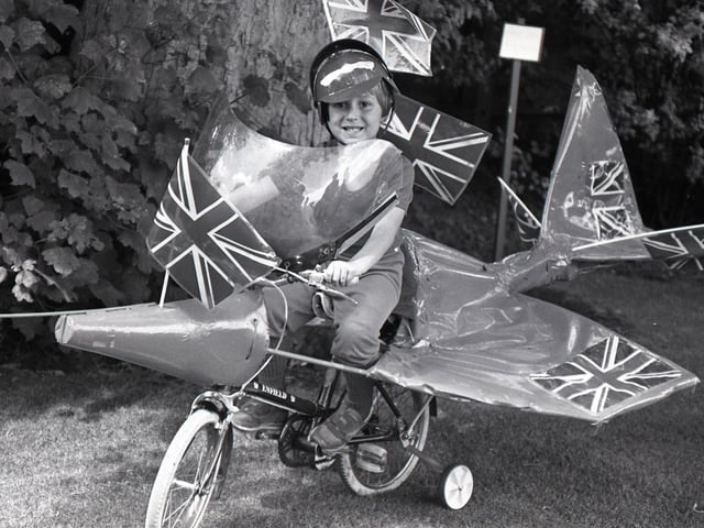 Is it a bird... is it a plane? No, it's five-year-old Luke Parkes flying high at the Elswick Gala. His Red Sparrow invention was one of many highlights at the Gala Day when villagers turned out in force to witness a festival of entertainment