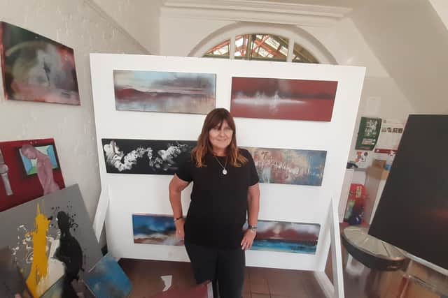 Carolyn Sillis with some of her other art work in her Fleetwood studio