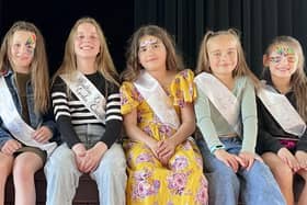 Poulton Gala Queen-elect Imogen Swarbrick (pictured in the black and white top) with some of her retinue of princesses at the fundraising event