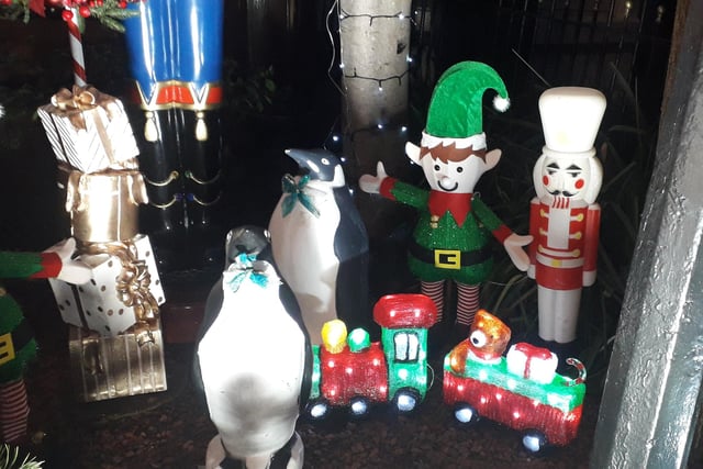 Penguins, an elf and a soldier help bring festive cheer to Michael Smith's front garden
