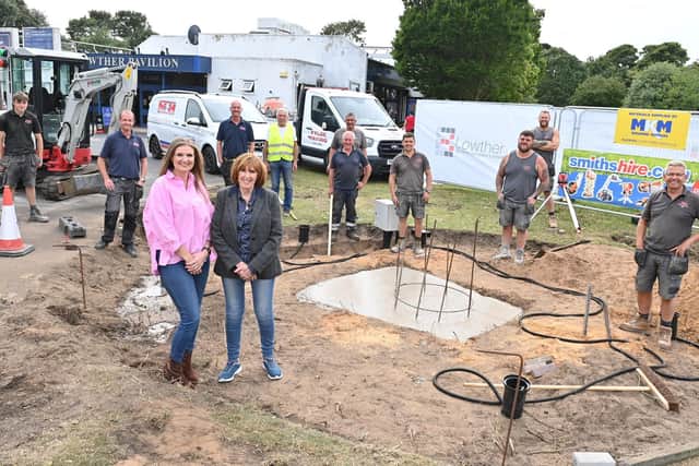 Yvonne Ball and daughter Joanne O’Sullivan with workers who have given up their time for free to prepare the site for the statue in memory of Bobby Ball at Lowther Gardens in Lytham