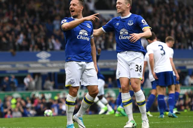 LIVERPOOL, ENGLAND - APRIL 09:  Phil Jagielka (L) of Everton celebrates scoring his team's third goal with Matthew Pennington during the Premier League match between Everton and Leicester City at Goodison Park on April 9, 2017 in Liverpool, England.  (Photo by Michael Regan/Getty Images)