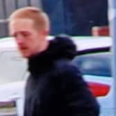 Do you recognise this man? Officers want to speak to him after a window was smashed following the Blackpool v Stevenage match (Credit: Lancashire Police)