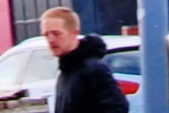 Do you recognise this man? Officers want to speak to him after a window was smashed following the Blackpool v Stevenage match (Credit: Lancashire Police)