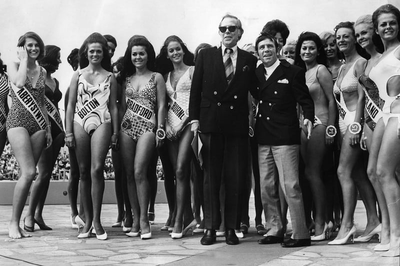 Dick Haymes and Norman Wisdom with some of the 43 finalists in the first round of the Miss United Kingdom Bathing Beauty Competition at the Open Air Baths, South Shore, August 1970