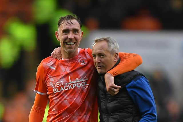 Neil Critchley with Richard Keogh (Photographer Dave Howarth/CameraSport)