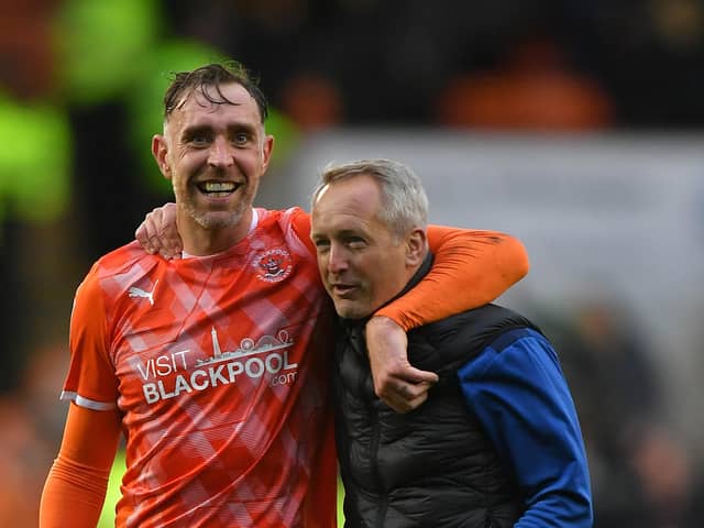Neil Critchley with Richard Keogh (Photographer Dave Howarth/CameraSport)