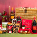 The Luxury Gift Basket, priced at £95, which includes fine wine, biscuits, handmade mini cakes.