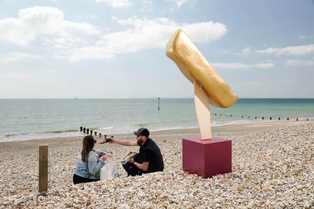 A giant golden chip statue is installed by vinegar brand Sarson’s to mark the launch of its ‘Fryday’ campaign to ‘save the UK’s chippies’, as over half are under threat of closure.