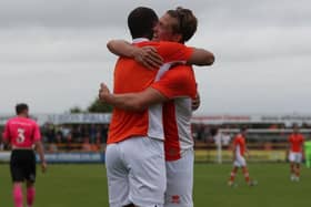 Kyle Vassell celebrates his goal with Max Clayton