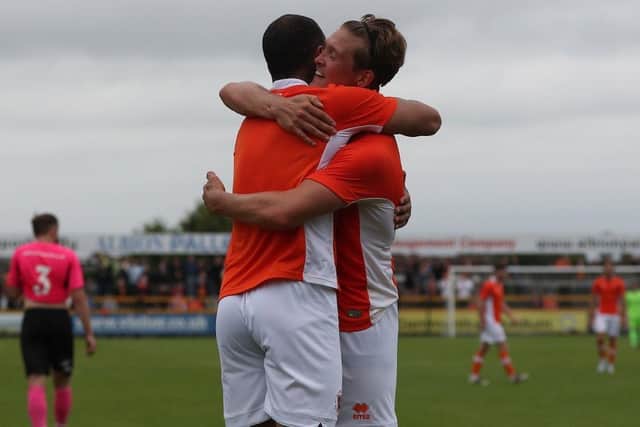 Kyle Vassell celebrates his goal with Max Clayton