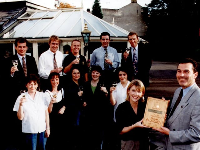 Staff and customers celebrating The Stag on Psalter Lane getting a service award in 1997