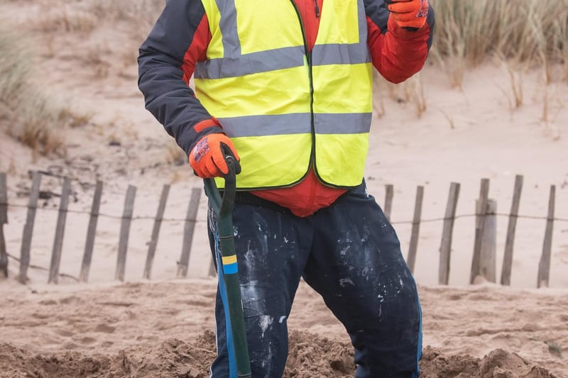 A job well done in Lancashire Wildlife Trust's Christmas tree planting on St Annes beach.
