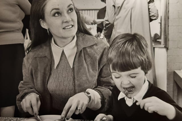 It's fair to say Andrew doesn't look too happy with his dinner in this Roseacre Primary School picture. With him is Mrs Farrow