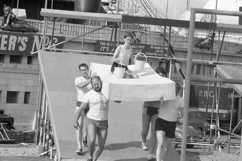 Competitors taking part in It's a Knockout at Blackpool's open air baths