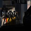 A customer arrives to re-fuel his car at a petrol station as fuel prices dip slightly in NI (photo by Bryn Colton/Getty Images)