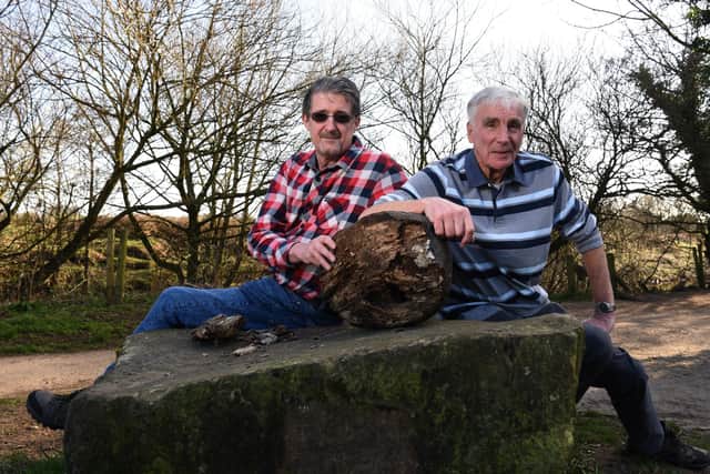 Mike Halford and Ron Freeland pictured by the remains of The Dipper sculpture on Garstang's Millennium Green Photo: Neil Cross