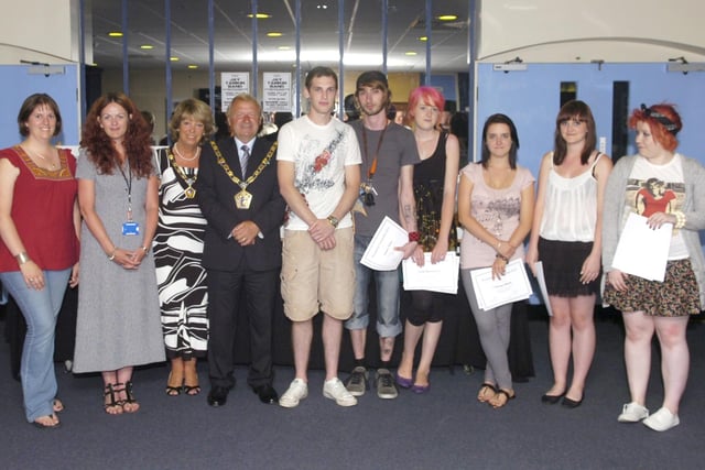 Blackpool and the Fylde College photography competition at Fleetwood.  Pictured are representatives from the college, Wyre council, and winning entrants
