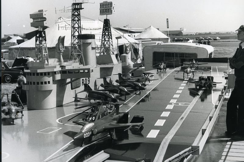 A schoolboy's delight - the huge model of the aircraft carrier Ark Royal with her decks displaying all the latest models of the Royal Navy Fleet Air Arm aircraft at Blackpool Air Pageant, May 1977