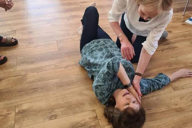 Recovery position during first aid. Photo: Skills Training Group