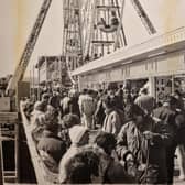 A scene of a packed pier in 1990