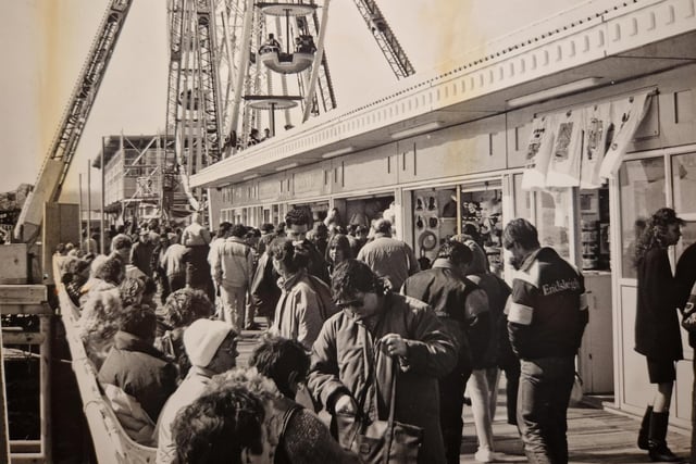 A scene of a packed pier in 1990