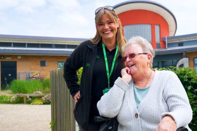 Rachel Denby, with local Sheila Underwood, outside the Grange community centre