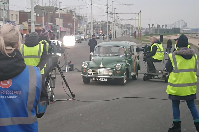 Coronation Street's Roy Cropper filming in his famous Morris Minor Traveller on the promenade