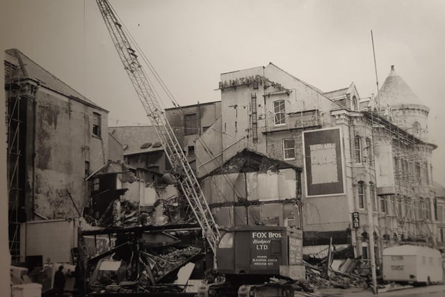 The caption on the back of this photo says: 'Standing on the Promenade watching the demolition of the Palatine building, a wave of nostalgia came for things long-ago and far away