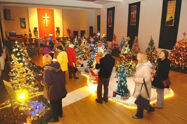 Visitors gather for the annual Fleetwood Christmas Tree Festival in a previous year