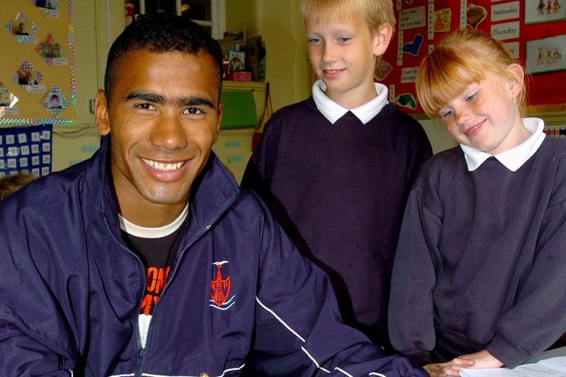 Costica Trandafir was training to be a teacher at Revoe Primary School in 2004. He is with Tanya Morgan (7) and Reece Fisher (8)