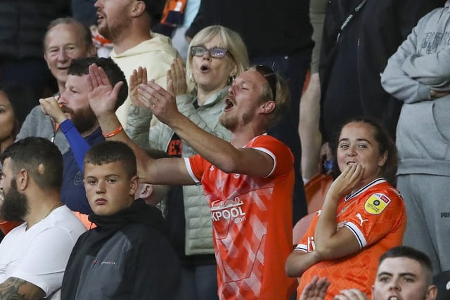 Blackpool fans watch their team in action