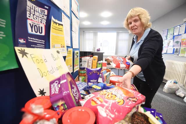 Volunteers Marian Salthouse with donated items at Fylde Foodbank in Kirkham.