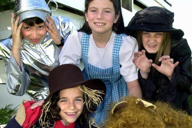 St Cuthbert's Primary School's dress rehearsal for Yellow Brick Road. Back, from left, Simon Castro, Kirsty Sagar and Joanne McConnell. Kneeling are Mary Hetherington (left) and Natasha Spearman in 2000