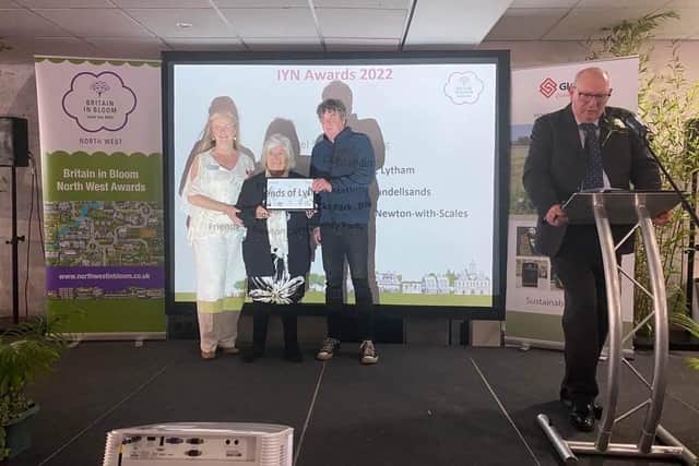Coun Brenda Blackshaw (middle) and representatives from the Friends of Lytham Station receiving the Level 5 – Outstanding Award