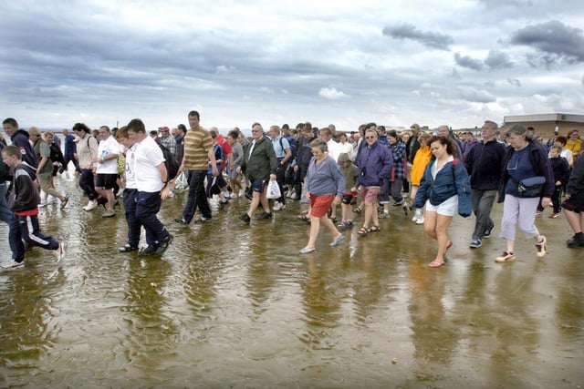 Striding across the sands in 2004