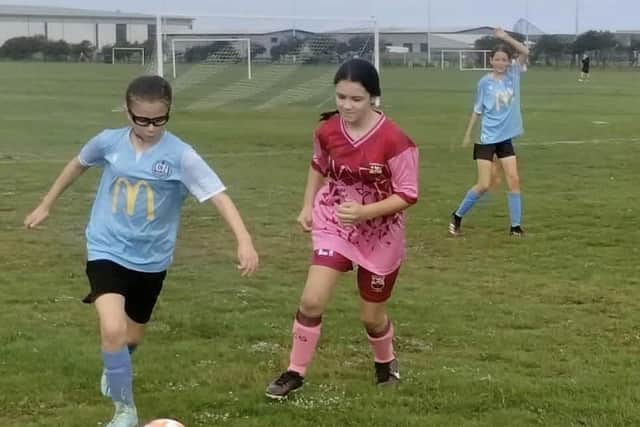 Lyla Barnes on a mazy run down the right wing. Photo: Duncan Barnes