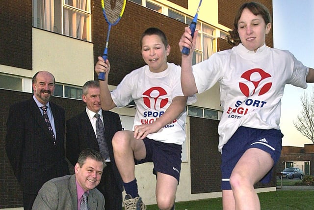 This was an impressive £4m cheque presentation to Palatine High School from Sport England in 2001. Palatine pupils Chris Truby and Toni Handley (both aged 13) pictured with, Palatine assistant headteacher Frank Shipway (standing, left), Blackpool Council Leader Roy Fisher (standing, second from left) and Sheldon Philips (Director of Sport England-North West).
