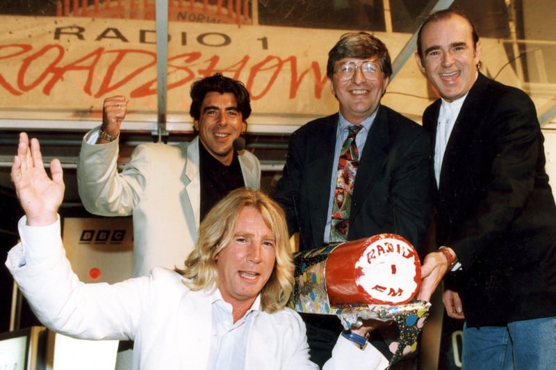 Lights switch on 1993 - Status Quo members Rick Parfitt and Francis Rossi with DJs Gary Davies and Simon Bates