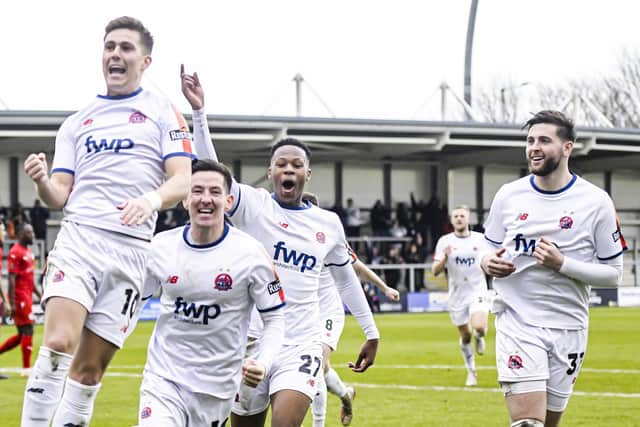 Nick Haughton and AFC Fylde team-mates celebrate his second goal Picture: Steve McLellan