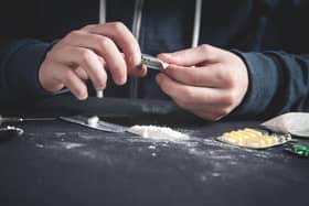 Two men charged after cops seize £1.36M of cocaine from car on the M6