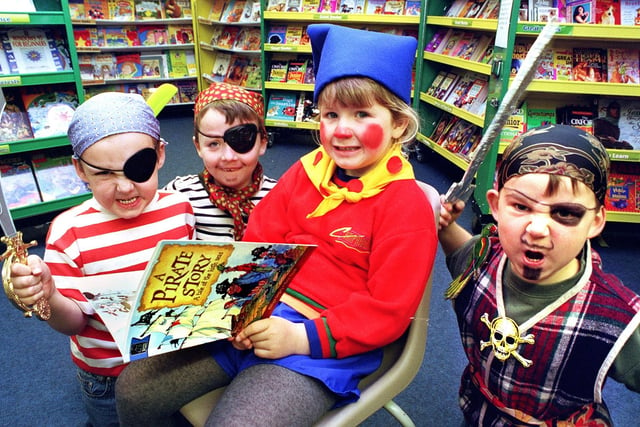 Book Week characters at Carleton Green Primary School, Poulton le Fylde. "Noddy" (four year old Eleanor Bloxham ) with pirates (from left), Adam Newstead (5), Sam Hicks  (6) and Connor Cavanagh(6)