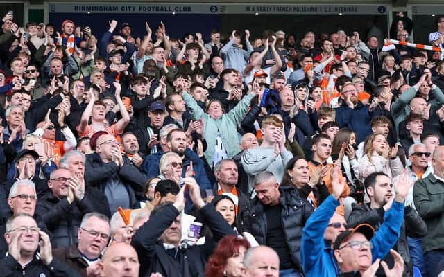Blackpool fans applaud their team at the final whistle