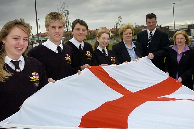 To mark the opening of their new buildings and St. George's Day, pupils and staff at St George's High School in Marton raised a new flag, 2004
Pictured left to right are Samantha Fletcher, Camryn Boshoff, Ben Edwards, Corinne Ashcroft, Christine Ibbotson, Sean Bullen, Pamela Baxter and Calvin Yuen